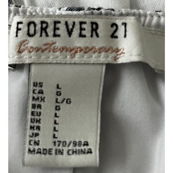 FOREVER 21 SLEEVELESS HALTER FIT & FLARE WAIST DRESS, WOMENS, L, BLACK/WHITE GEO - Picture 10 of 11